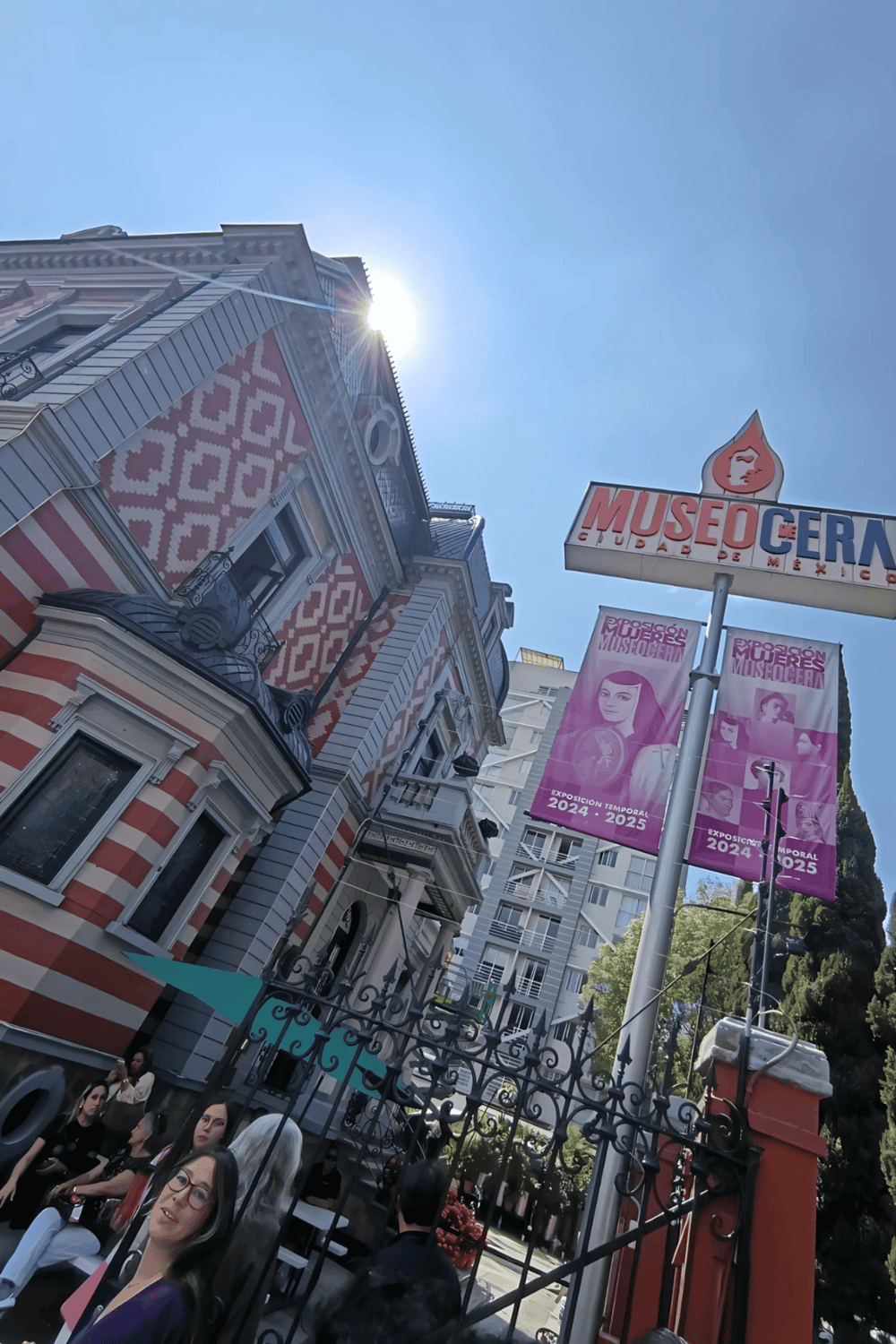 Sunny day at the Museum of Women in Mexico City, vibrant architecture and cultural exhibits.