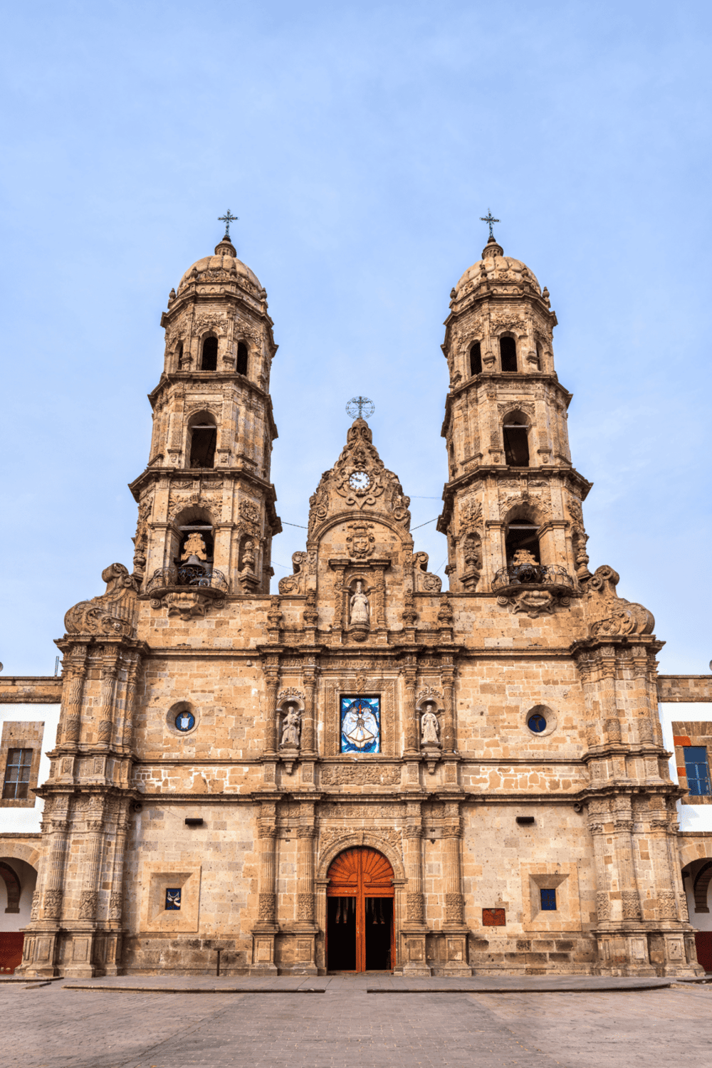 Gothic-style church with twin bell towers in Mexico City, historical landmark and religious site.