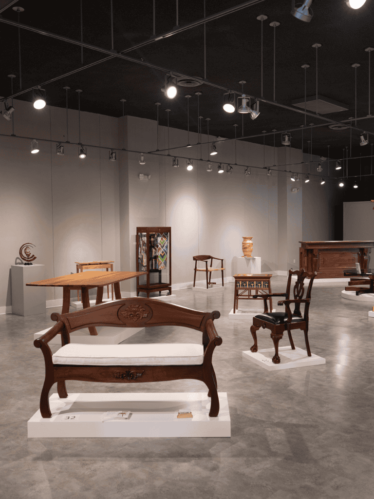 Elegant antique furniture display at QuestForDirections furniture gallery.