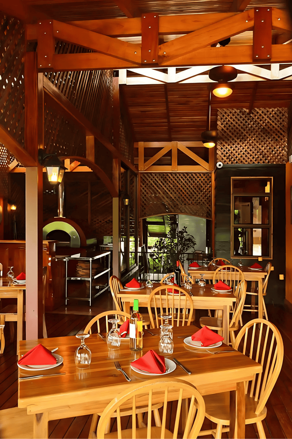 Cozy wooden restaurant interior with vibrant dining setup and warm ambiance.