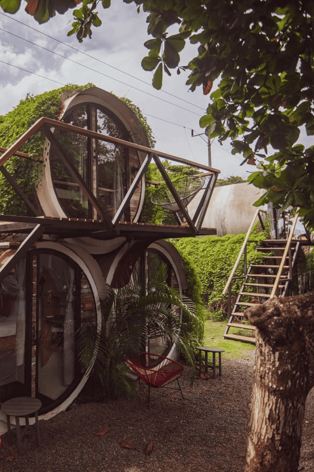 Eco-friendly Circular Tiny House with Balcony, Surrounded by Nature.