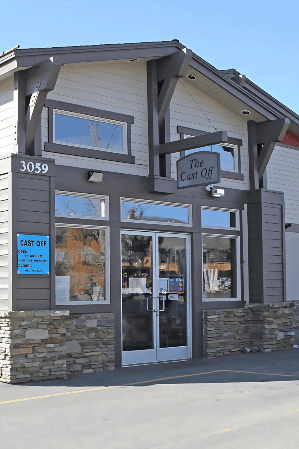Modern restaurant storefront with street parking, promoting online ordering & local dining options.
