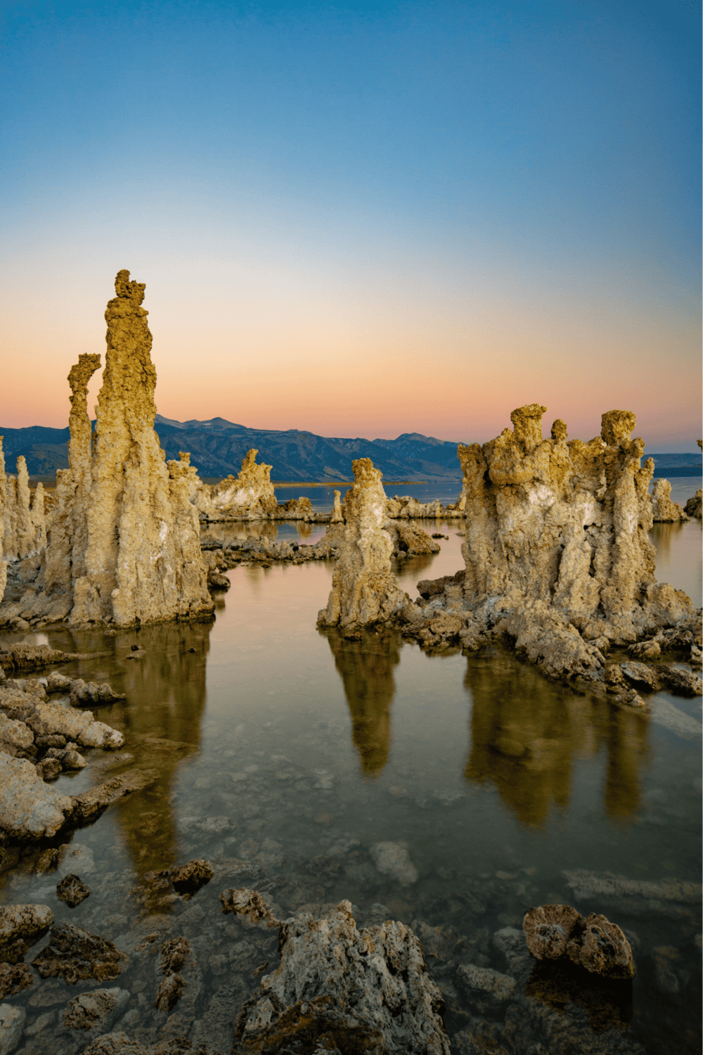 Unique tufa formations at Mono Lake during sunset, iconic travel destination, natural wonder, travel photography.