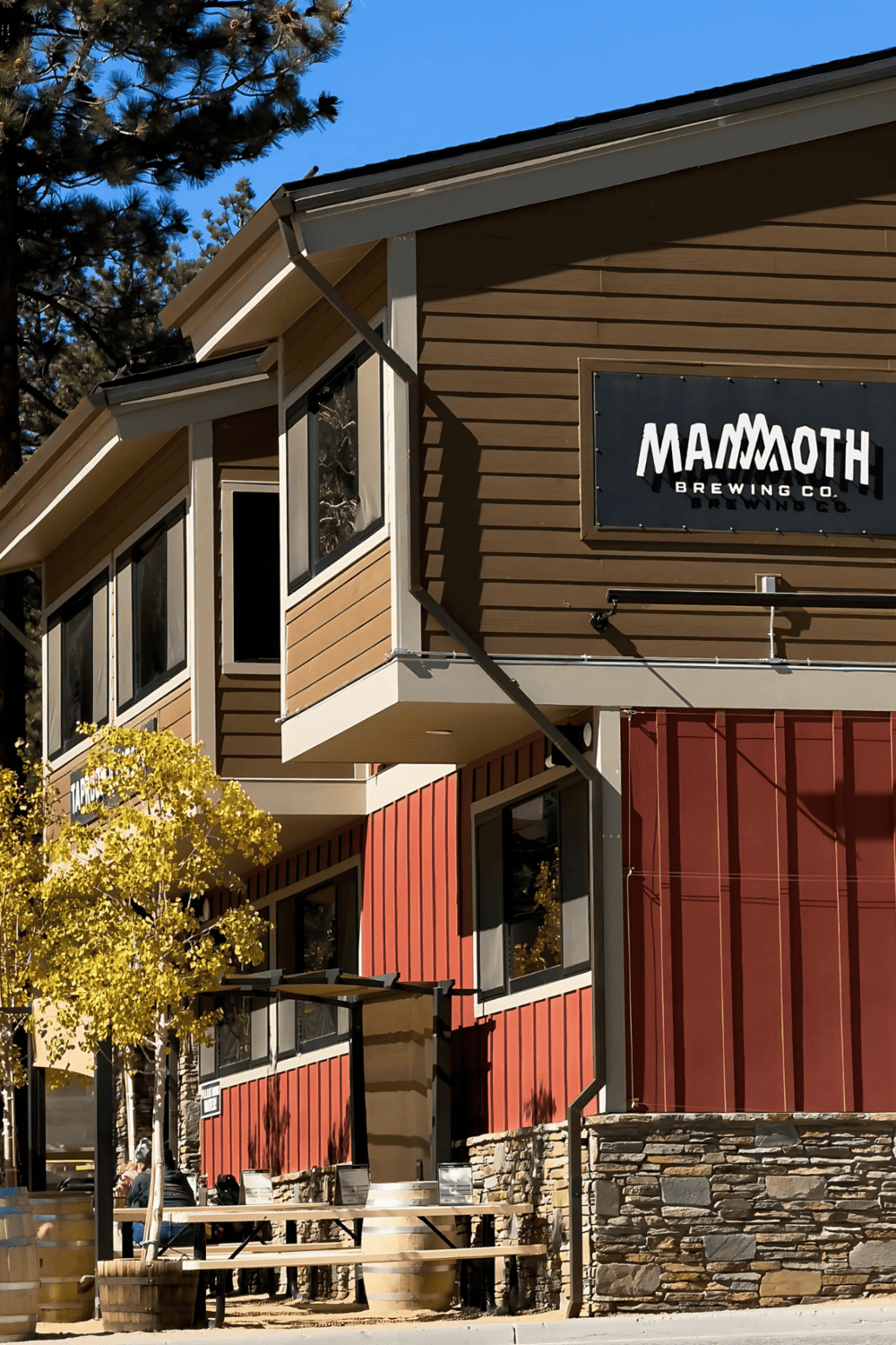 Mammoth Brewing Co restaurant exterior in Mammoth Lakes, California, showcasing inviting outdoor seating and mountain ambiance.