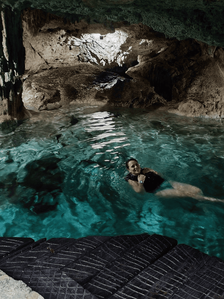 Cold water cave swimming adventure during quest for directions.