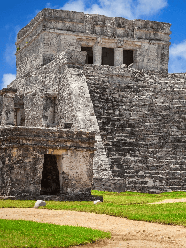 Ancient Mayan pyramid structure at Tulum, Mexico, showcasing archaeological ruins and historical significance.