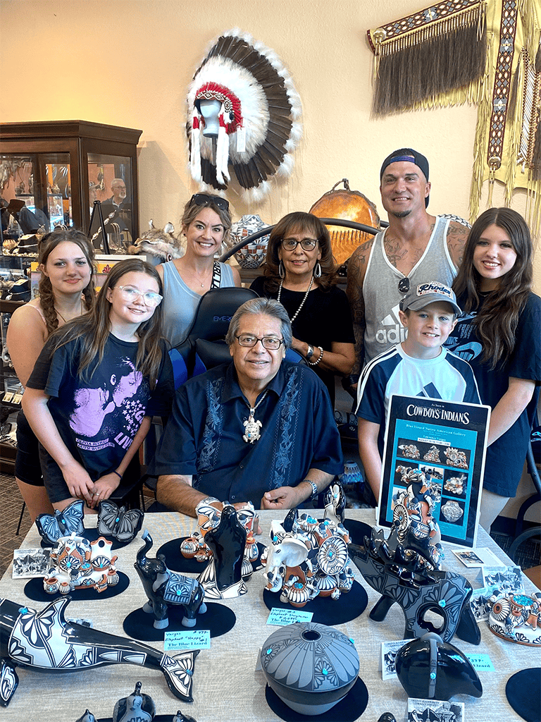 Colorful Native American pottery display at QuestForDirections exhibit event.