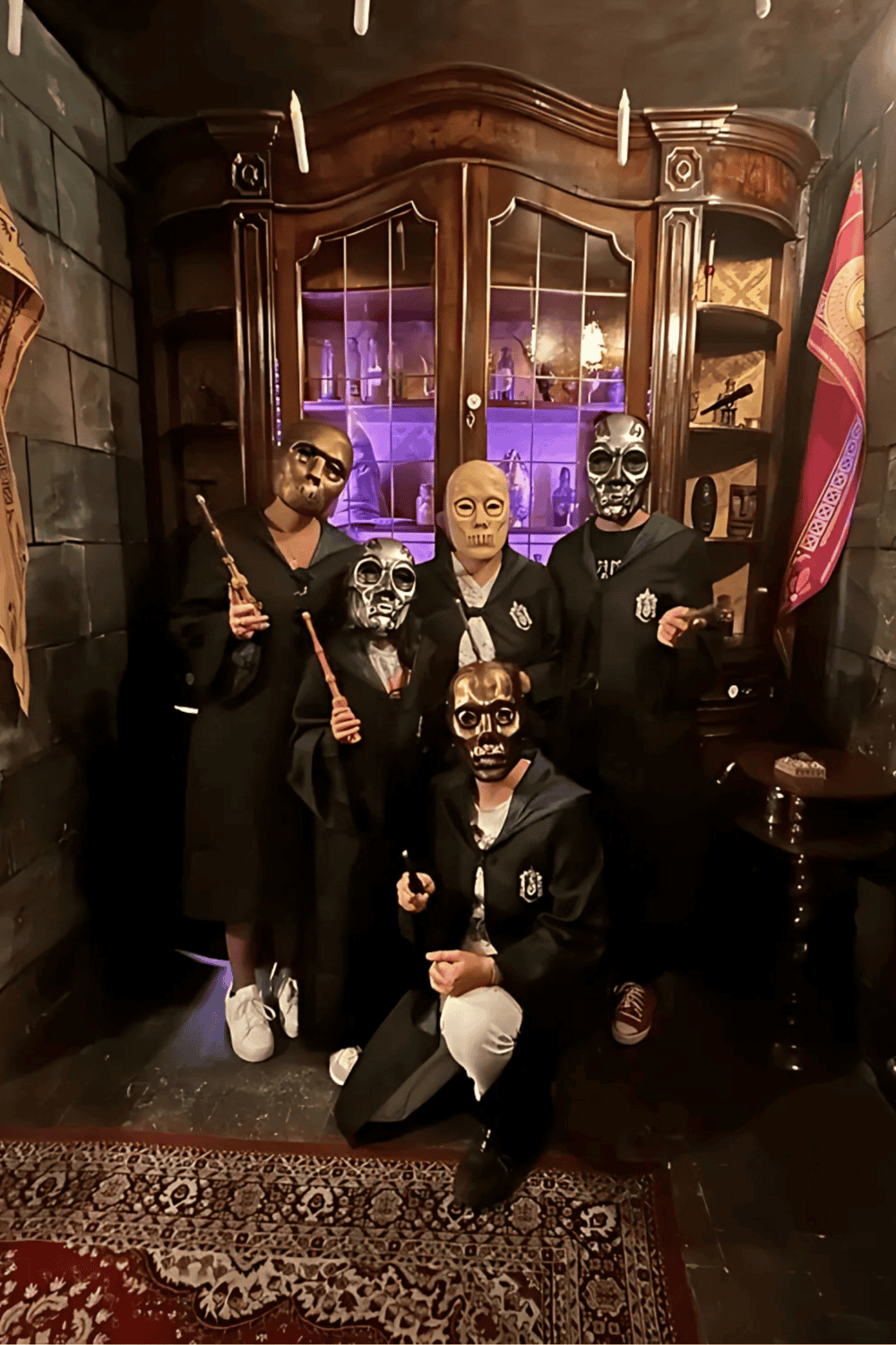 Spooky masks and costumes at QuestForDirections Halloween event, creating a thrilling haunted house experience.