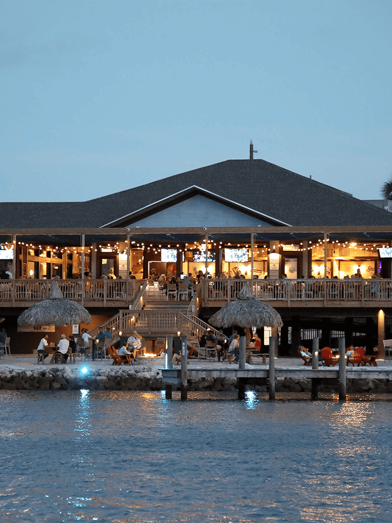 Waterfront dining at QuestForDirections restaurant, offering scenic views and delicious cuisine.