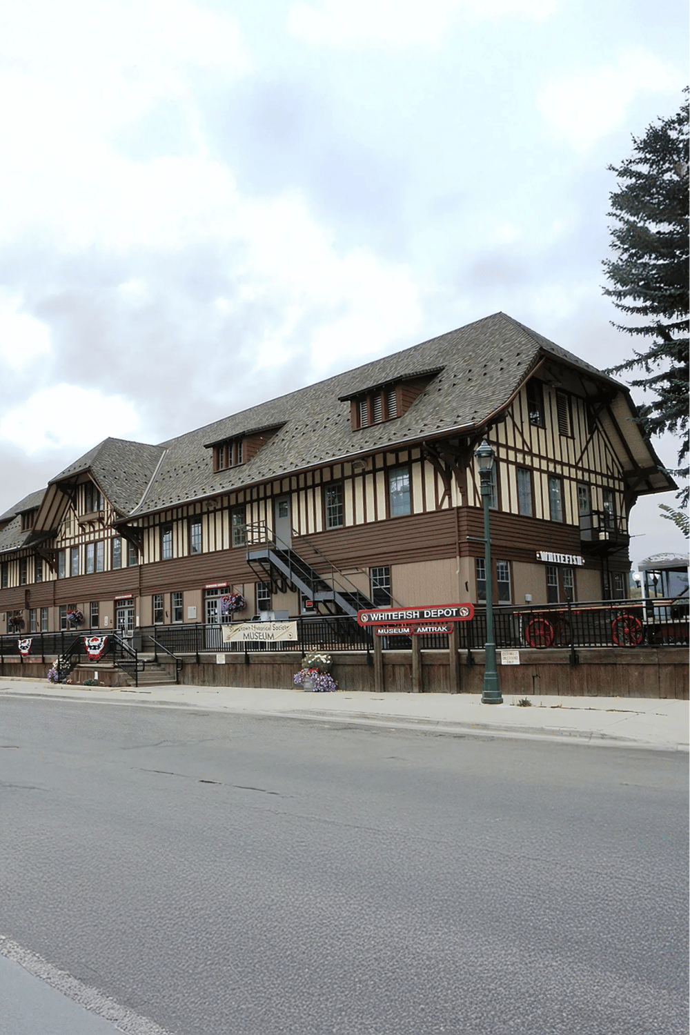 Historic Whitefish Depot building with museum and Amtrak station in Whitefish, Montana.