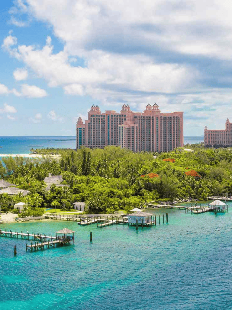 Luxurious beachfront resort with ocean views and lush greenery, perfect for relaxing holidays.