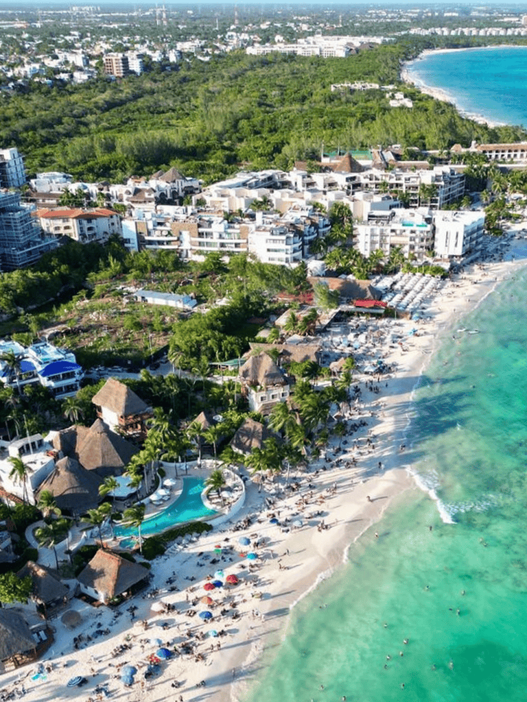 Luxurious beach resort with ocean views, tropical gardens, and modern accommodations in a stunning coastal setting.