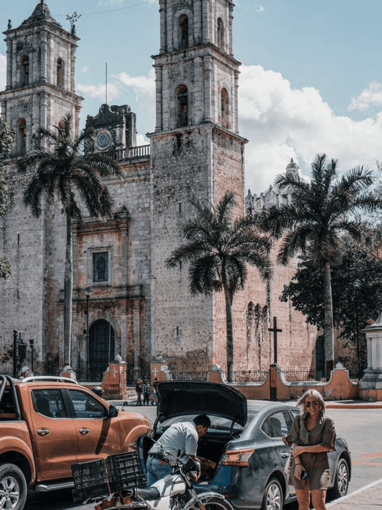 1. Old church with twin towers and palm trees, historic site, traveling in QuestForDirections.
