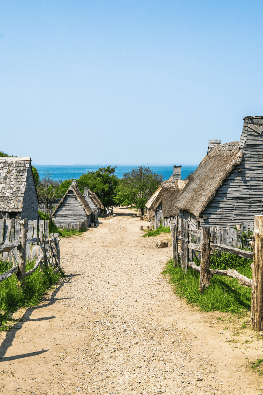 1. Authentic historic village with ancient wooden houses and ocean view, perfect for travel and cultural exploration.