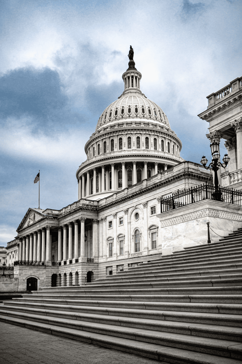 Capitol Building in Washington D.C. with neoclassical architecture and steps.