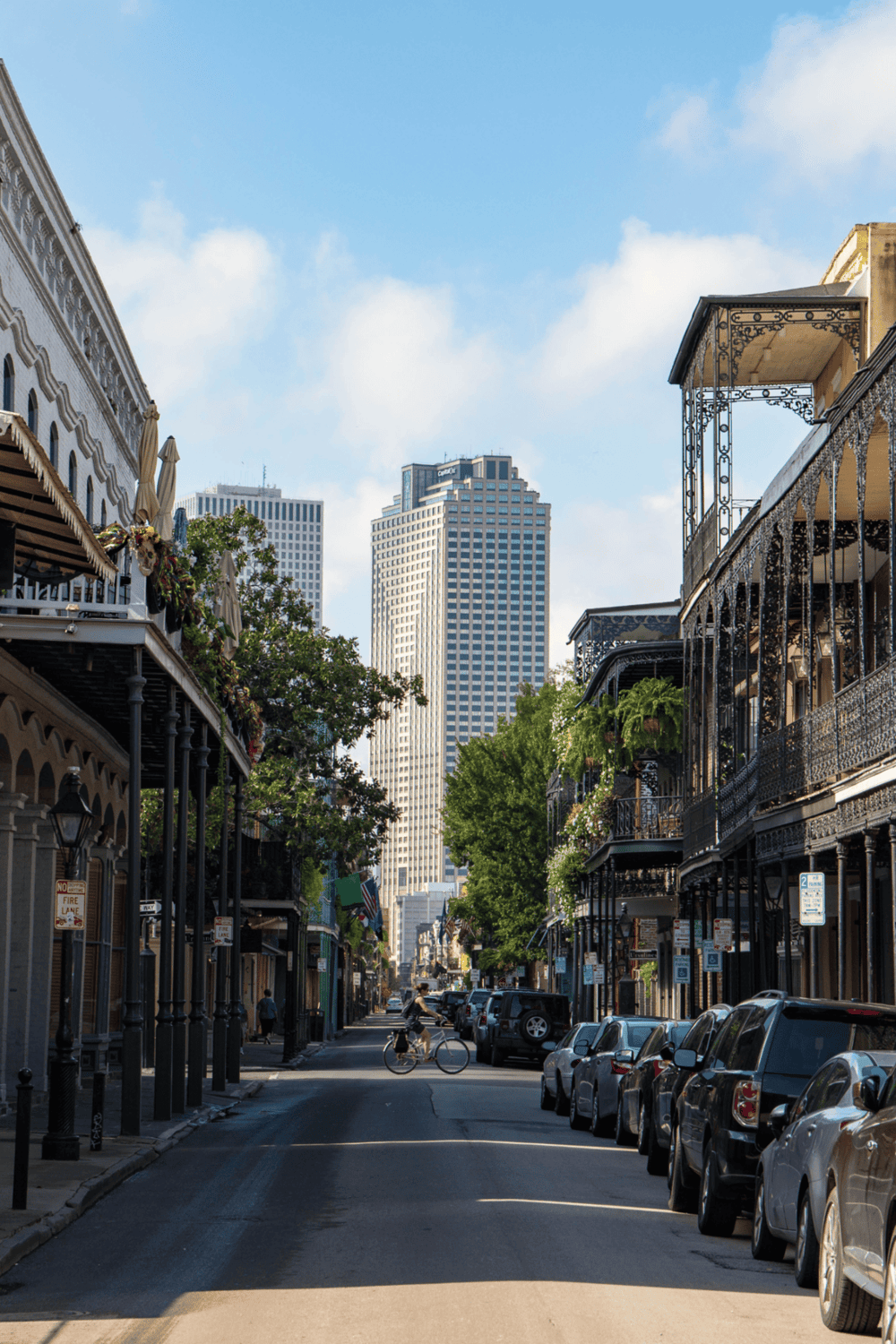 Quiet downtown street with historic buildings and modern skyscrapers, perfect for city exploration.