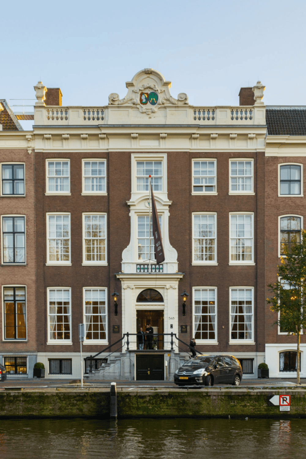 Charming historic building in Amsterdam, Netherlands, captured along the canal.