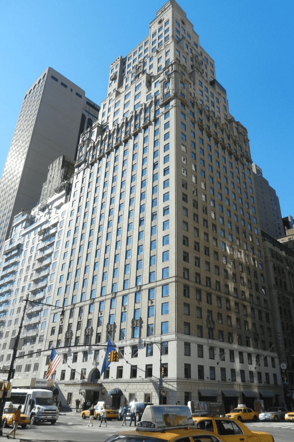 Historic New York City skyscraper, architecture, urban skyline, downtown Manhattan, tall building, city traffic, commercial district.