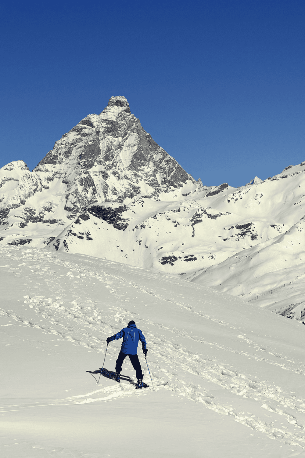 Mountain climber skiing in snowy Himalayas, Adventure travel, QuestForDirections tourism, rugged mountain exploration.