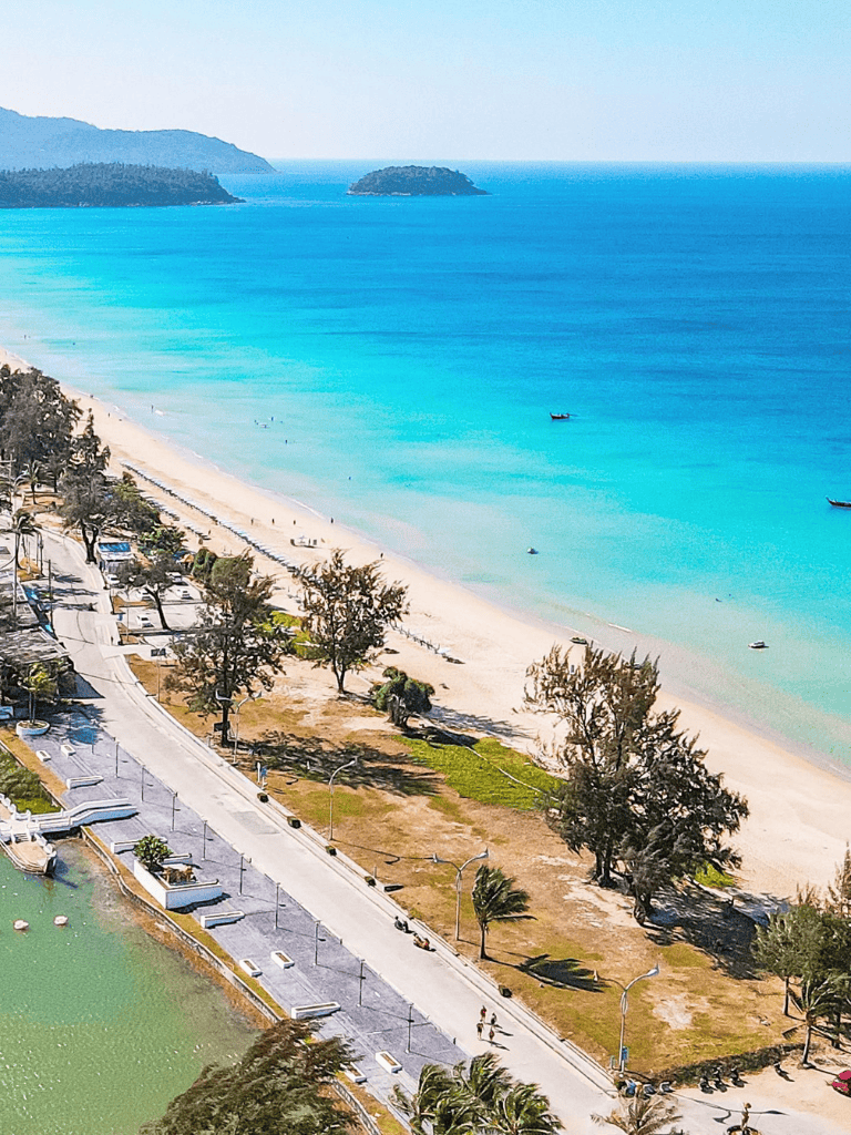 Vibrant beach scenery with turquoise waters and coastal parkway near QuestForDirections.