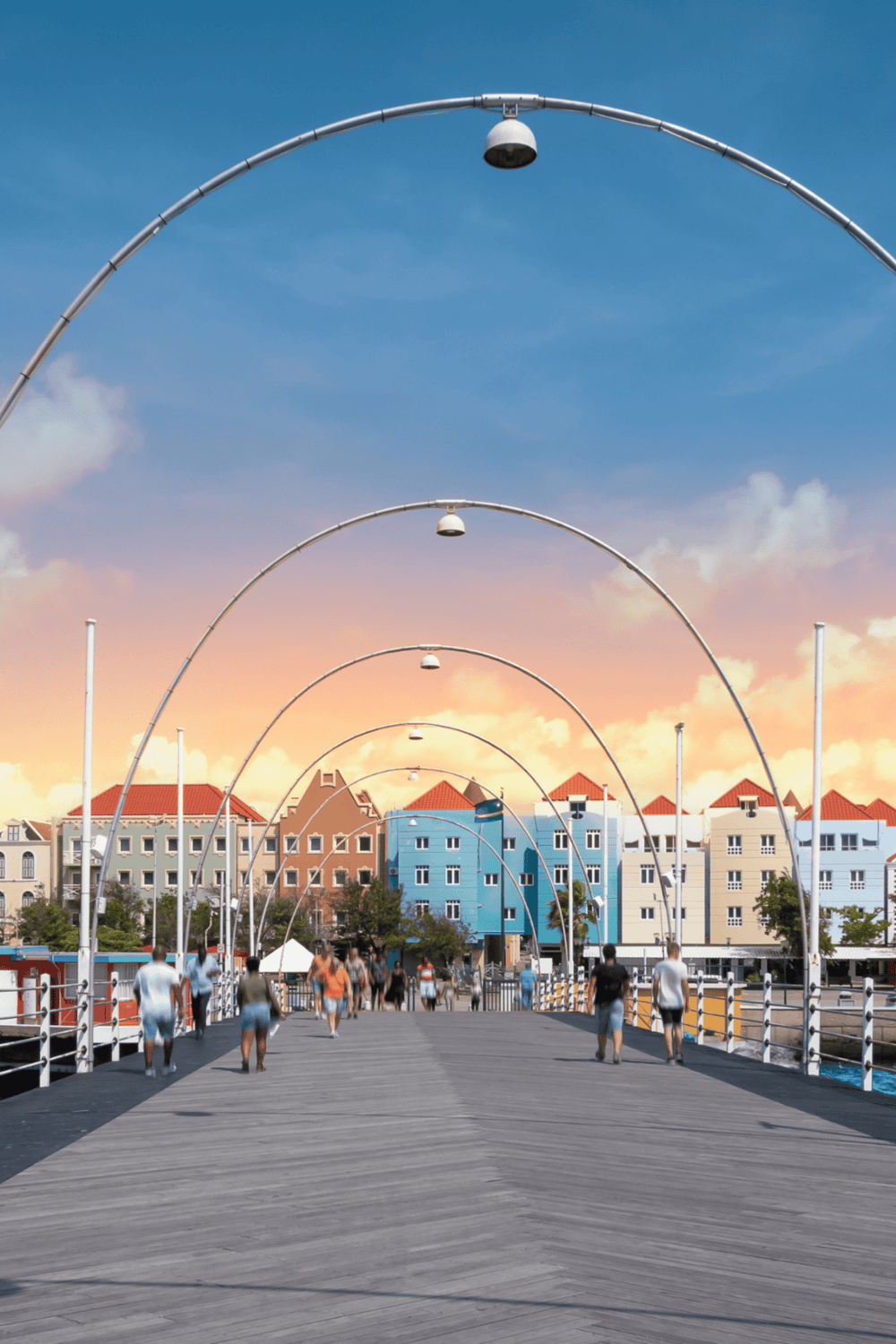 Vibrant cityscape with colorful buildings and modern walkways at sunset, perfect for navigation and direction services.