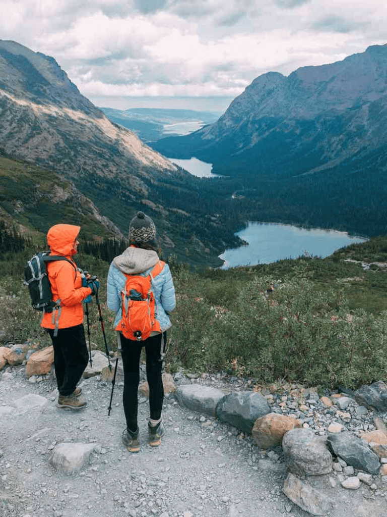 Enjoying a mountain hike with scenic lake views, adventure, and outdoor exploration.