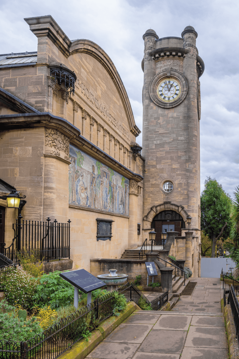 Clock tower at historic Landmark, iconic architecture, downtown, detailed facade, visitor attraction.