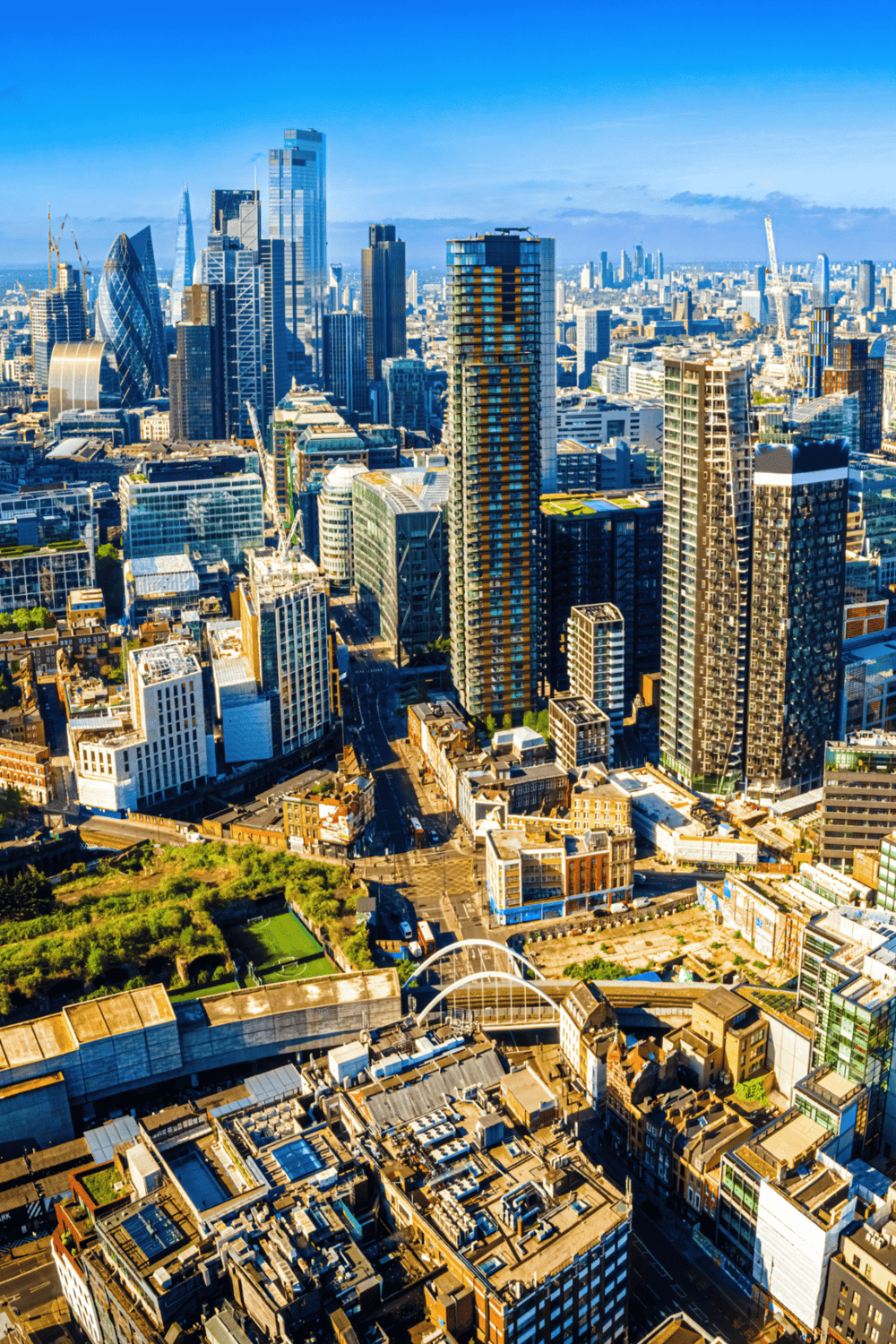 Modern downtown city skyline with skyscrapers and urban architecture in London, UK.