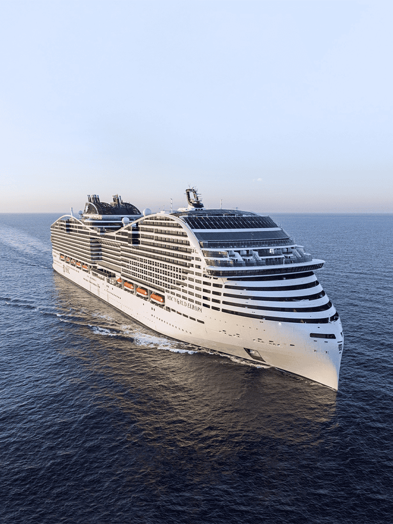 Luxurious cruise ship MSC World Europa sailing at sea, offering premium travel experiences.