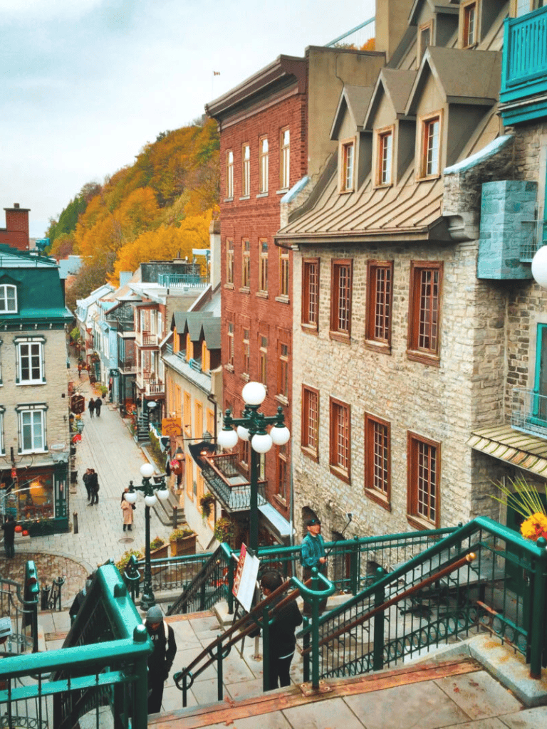 Charming historic street with colorful buildings in Quebec City, perfect for sightseeing and exploring.