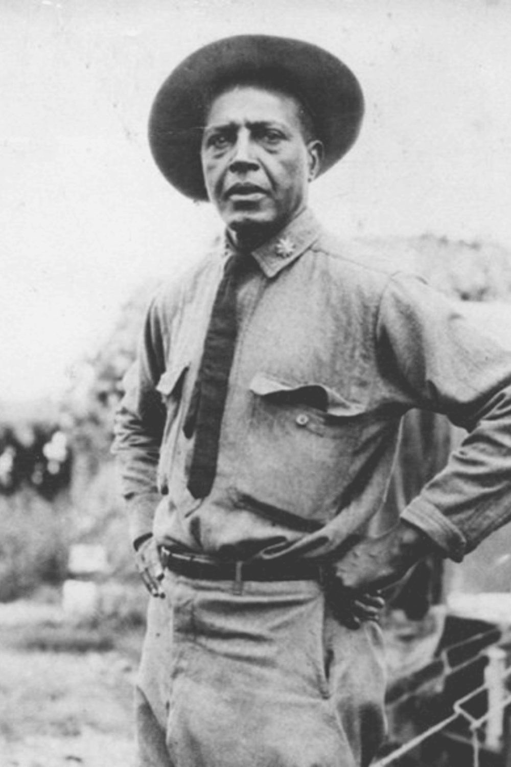African American military leader in uniform, historic black and white photo.