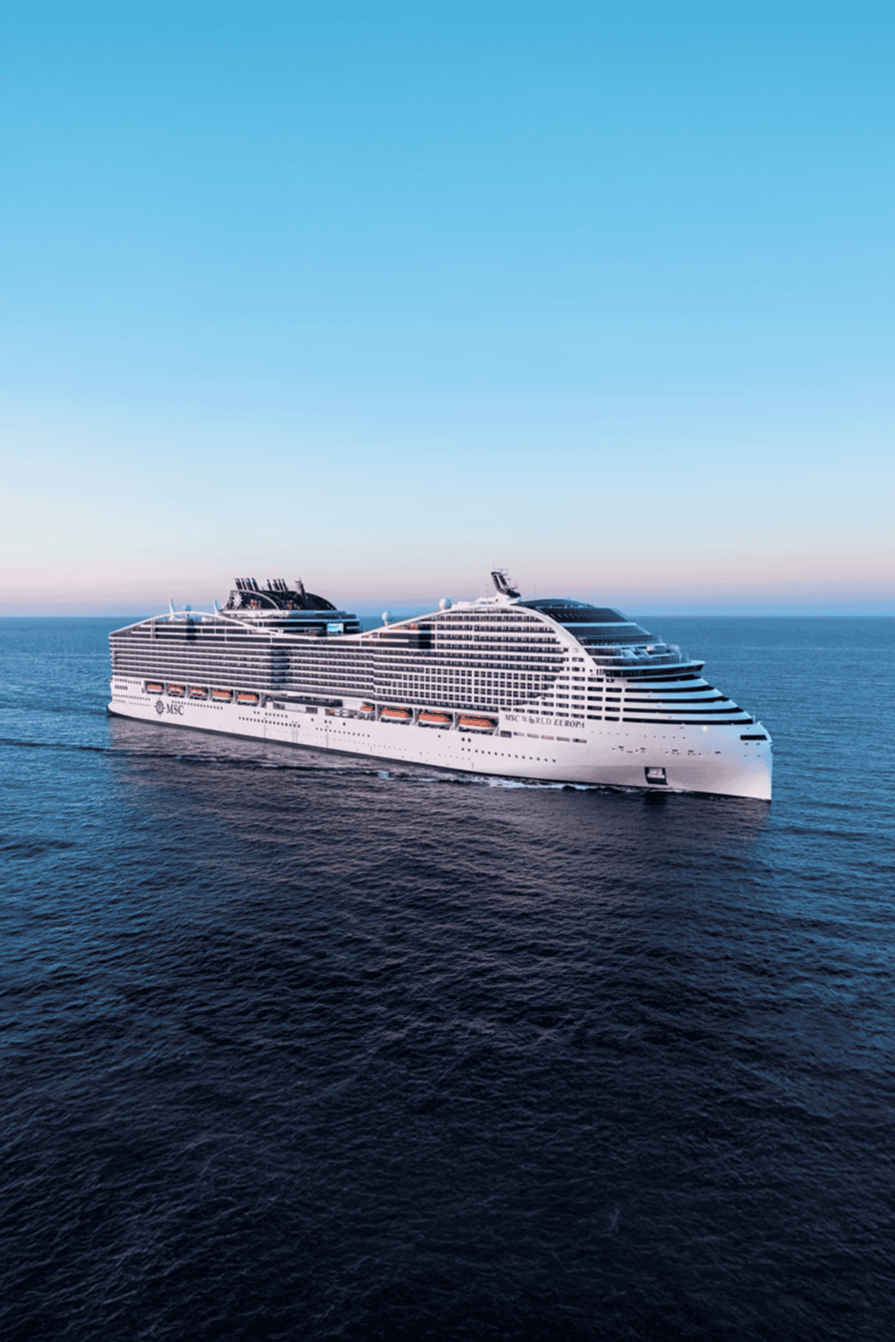 Luxury cruise ship sailing on open sea, modern maritime travel, ocean voyage, cruise liner, adventure at sea.