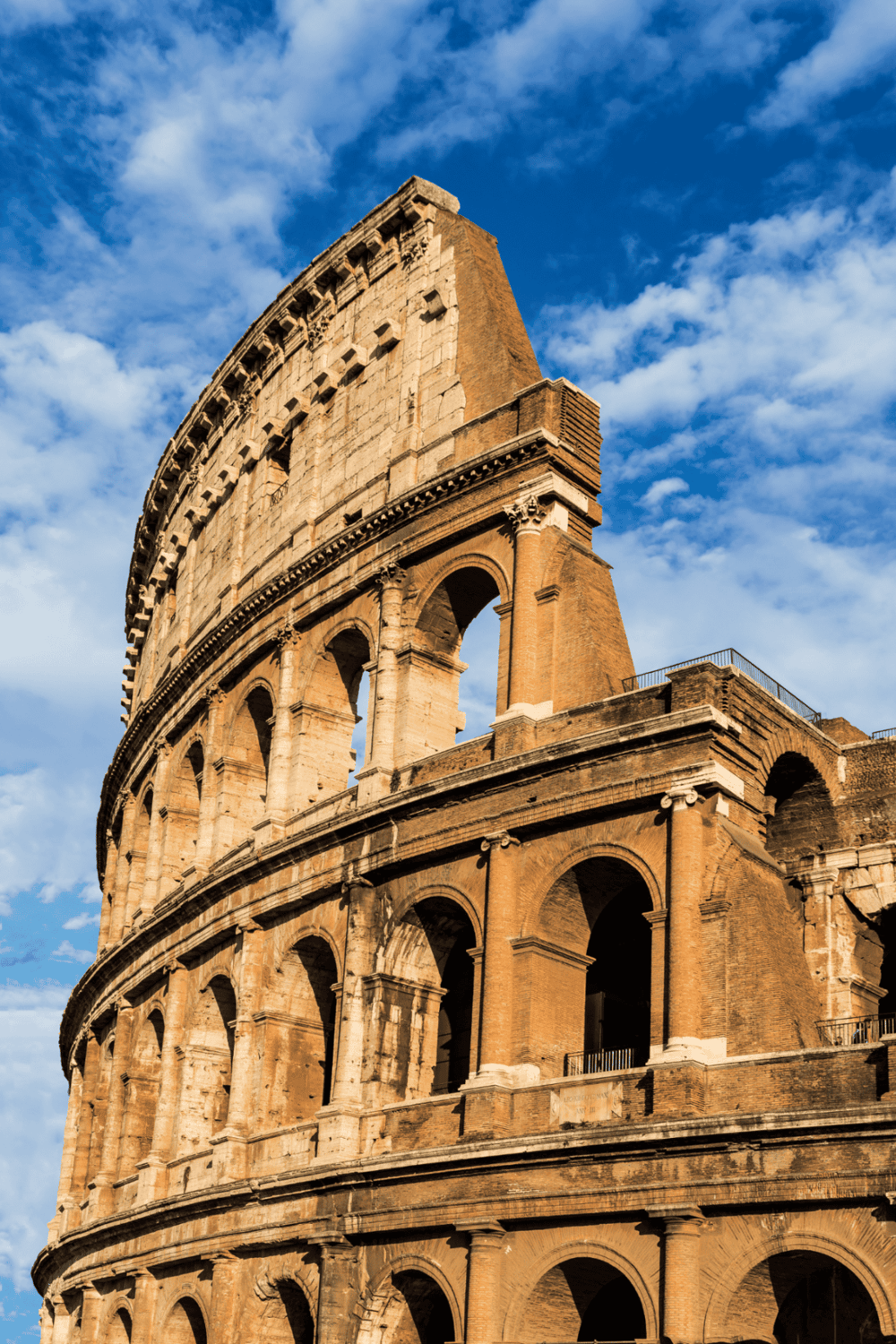 Ancient Roman Colosseum, iconic landmark in Rome, Italy, historical tourist attraction, terracotta stone archway.