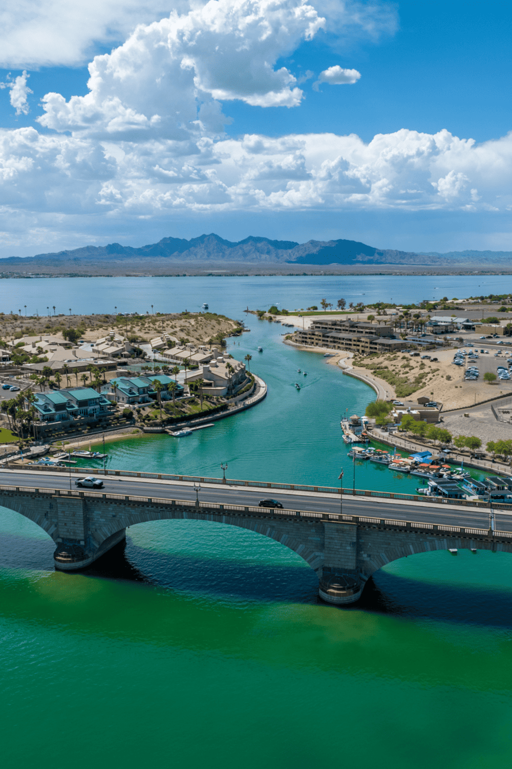 1. Aerial view of Lake Havasu City with London Bridge and desert landscape, popular outdoor destination.