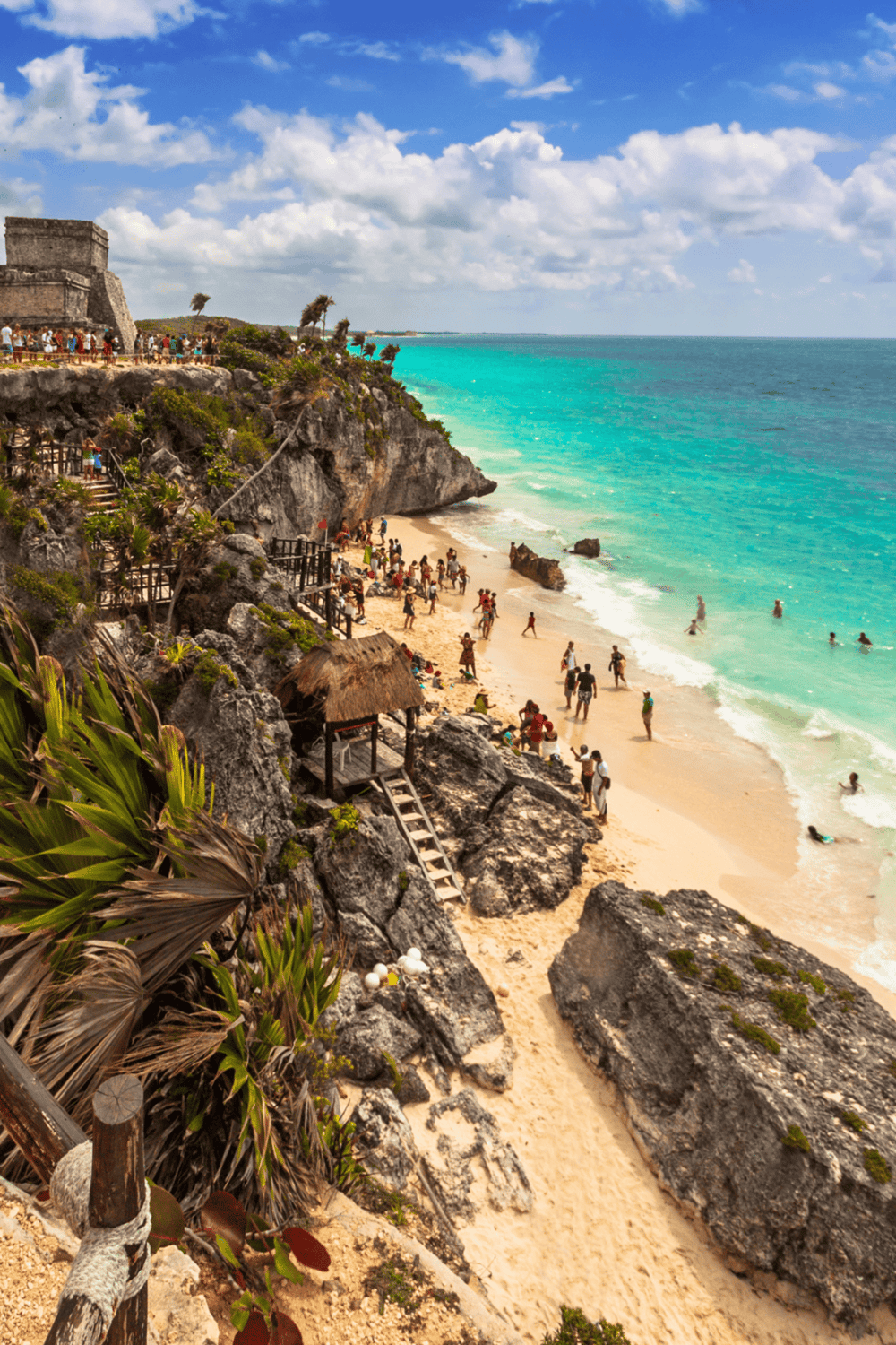 1. Vibrant beach at Chichen Itza Mayan ruin site with turquoise water and ancient stone structures.