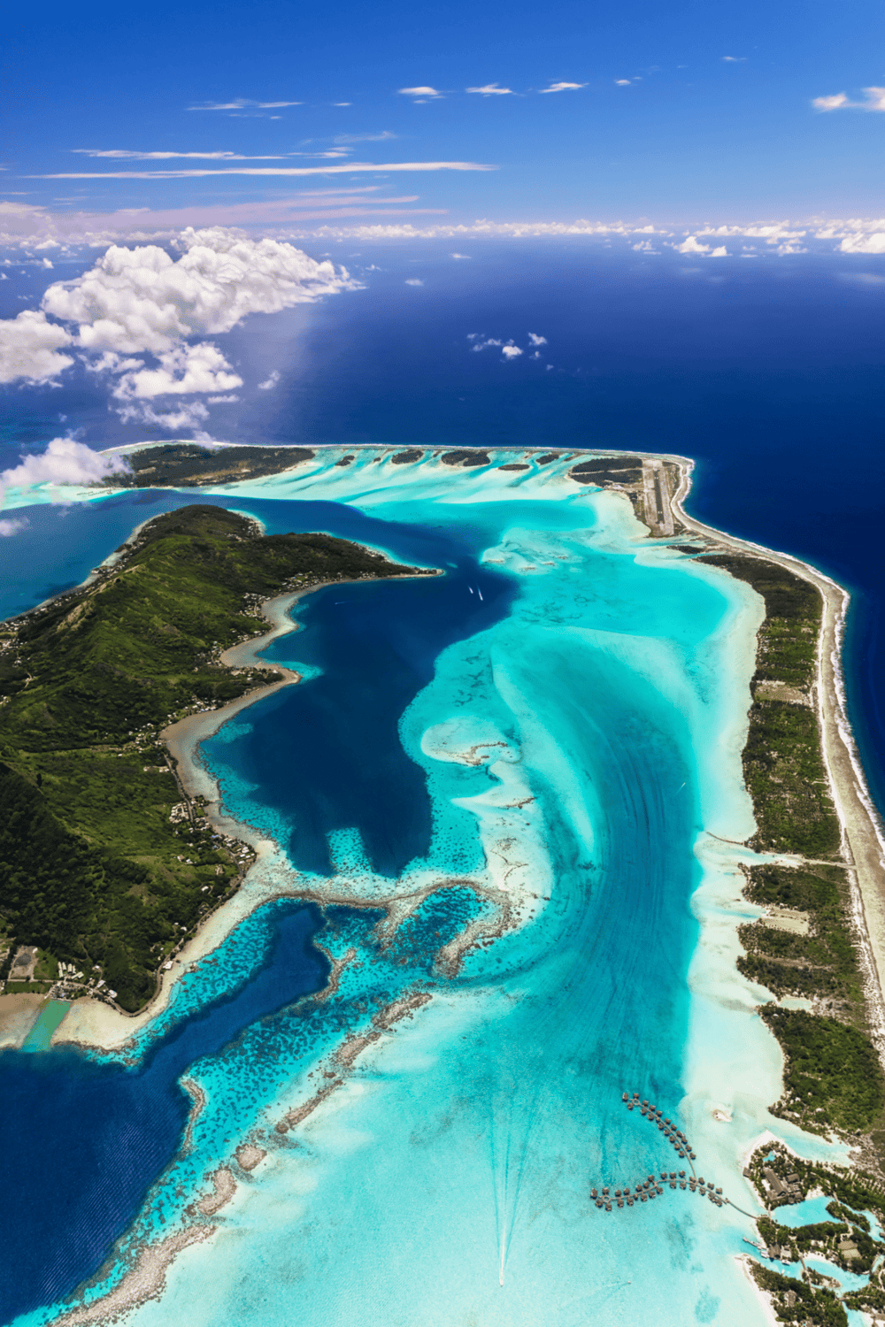 Beach destination with turquoise waters and lush landscapes.