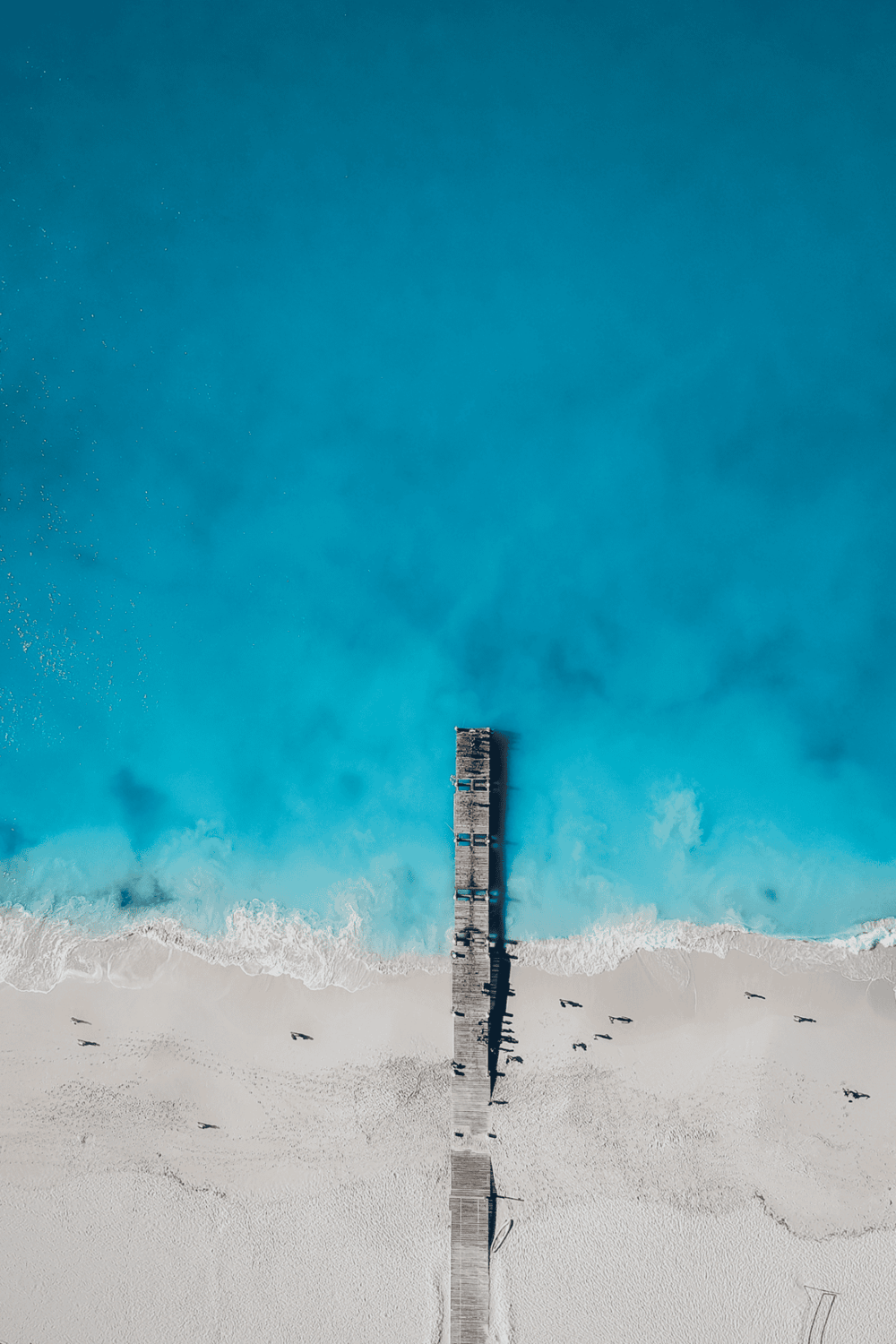 Seaside pier over turquoise water, beach, ocean, summer, travel, relaxing, destination.