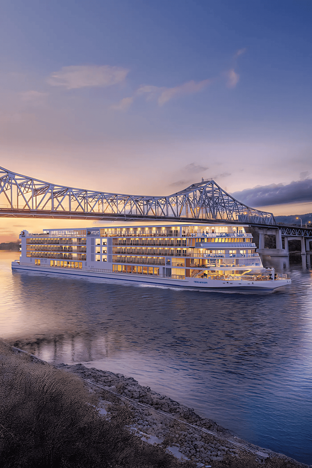 Luxury cruise ship sailing on river during sunset, modern river cruise experience.