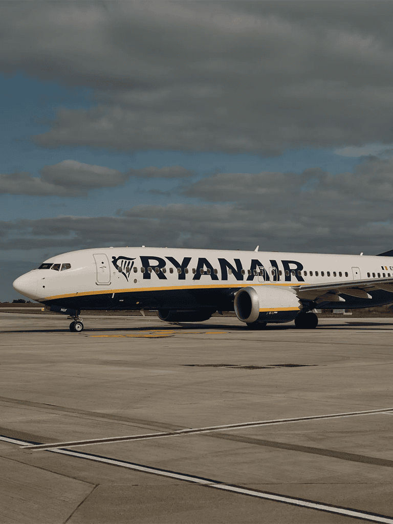 Ryanair airplane on runway, low-cost flights, travel, airport transportation, European airline.