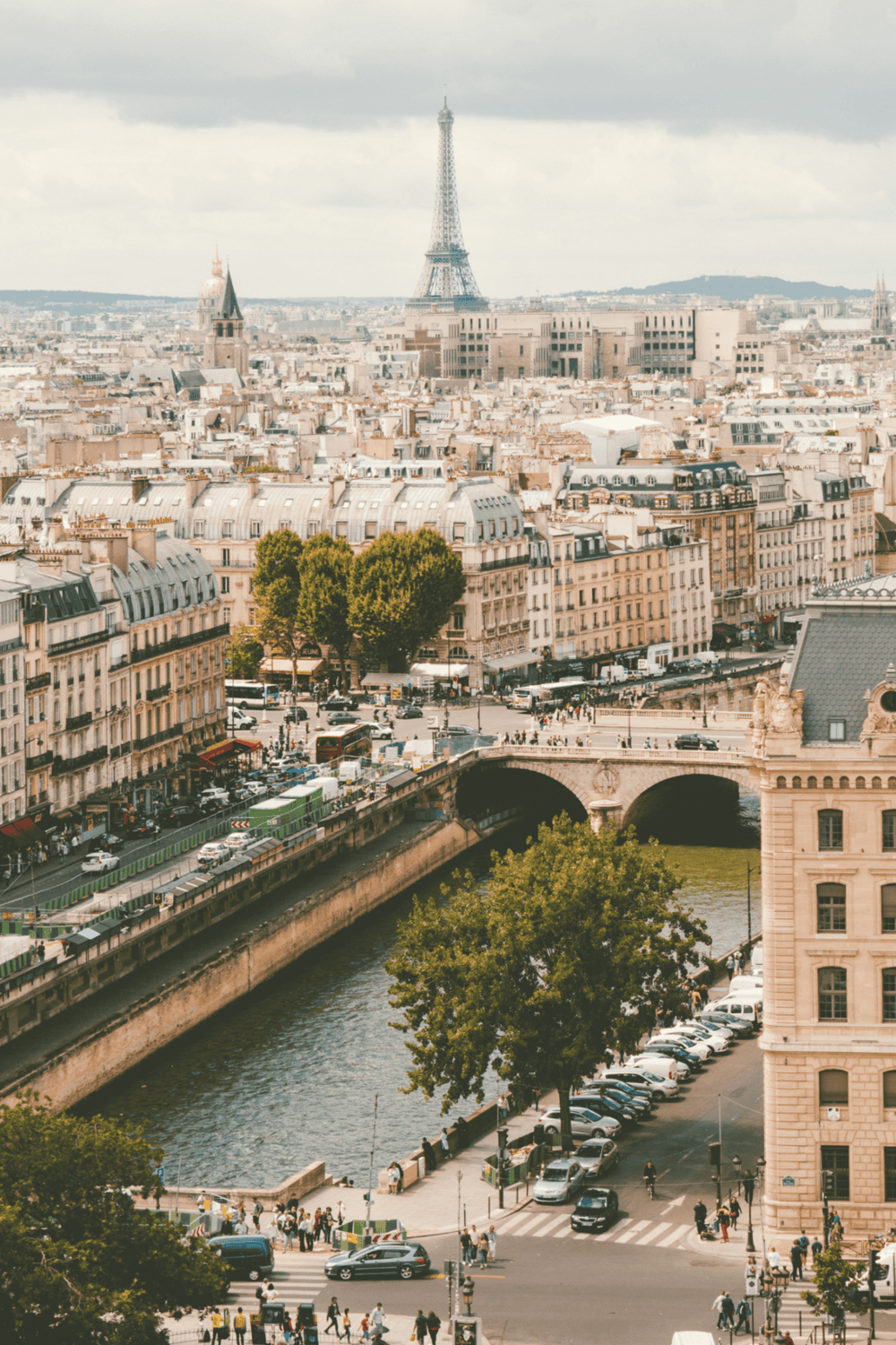 Eiffel Tower view over Paris cityscape and river Seine, iconic French landmarks, travel, sightseeing, urban scenery.