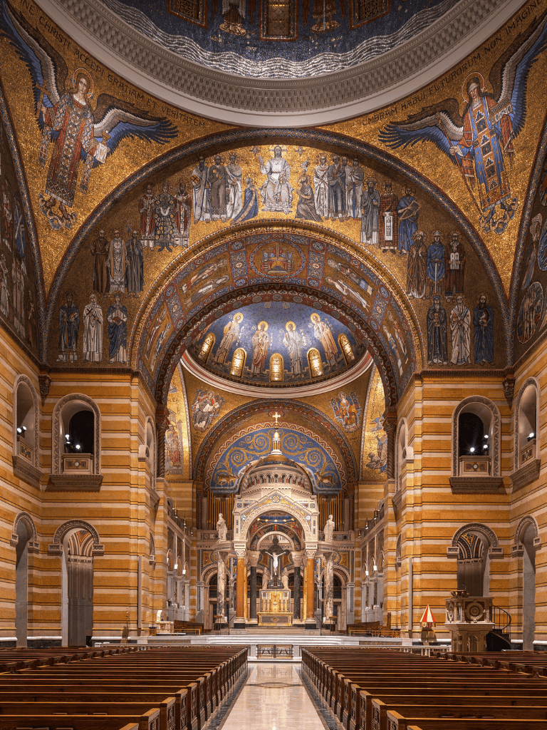 Ornate church interior with golden mosaics and religious icons, emphasizing spirituality and sacred architecture.