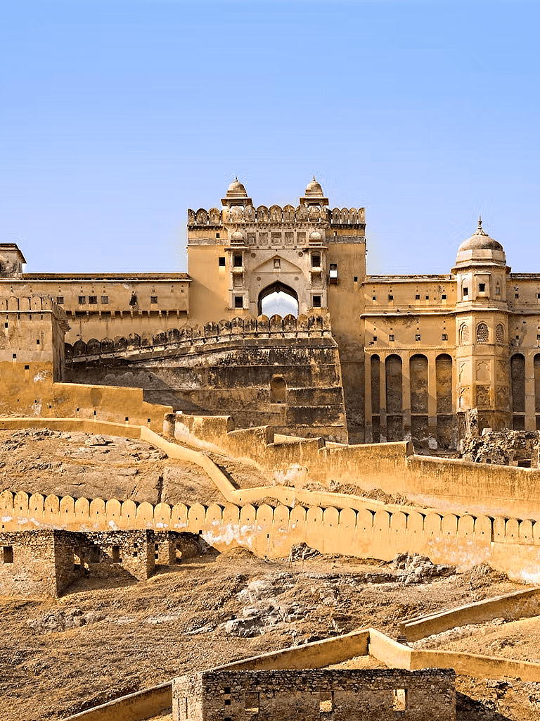 Ancient fortification with massive walls and towers at historic Amber Fort, Jaipur, India.