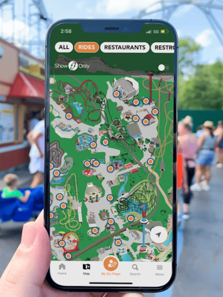 Map of amusement park with rides, restaurants, and attractions on mobile app interface.