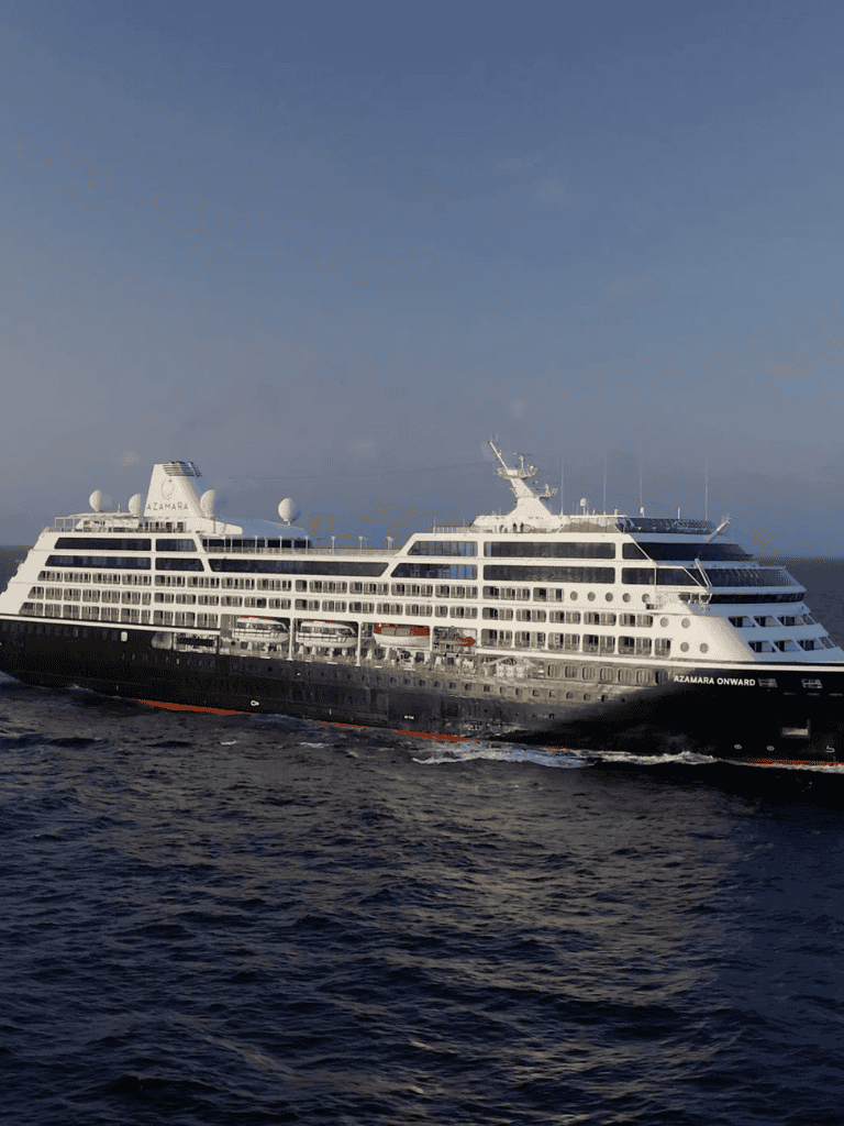 Luxury cruise ship Azamara Onward sailing at sea, travel, vacation, cruise experience, ocean voyage, adventure, luxury yacht, maritime tourism, destination travel, ocean liner.