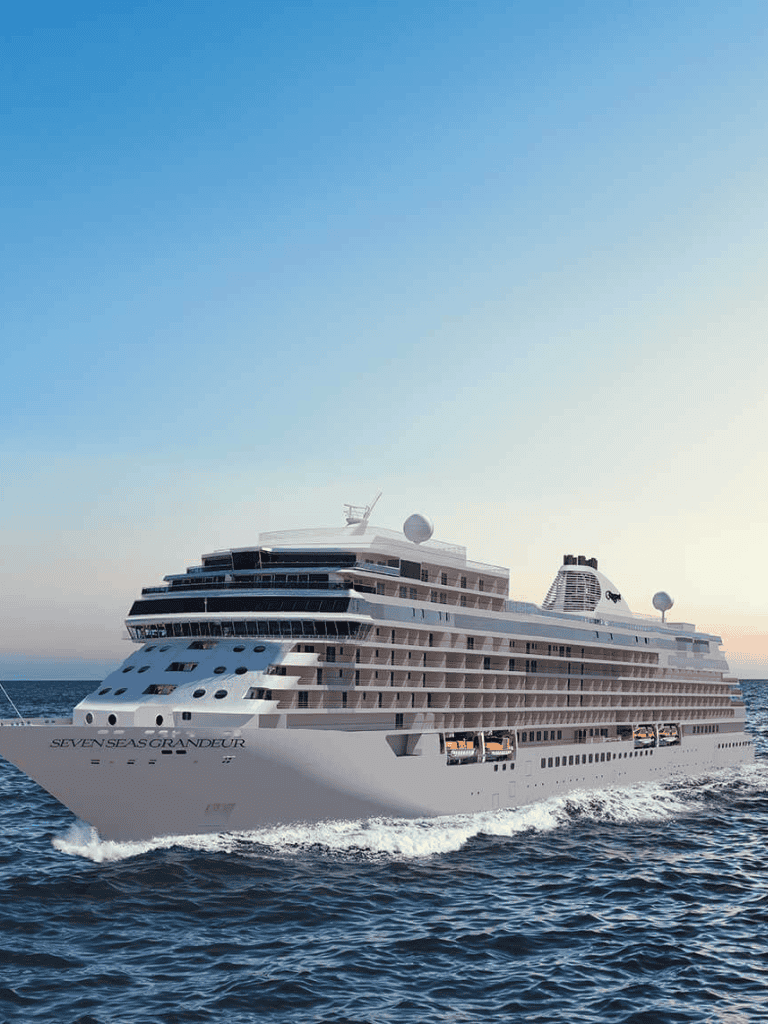 Luxury cruise ship Seven Seas Grandeur sailing at sea for travel and vacation planning.