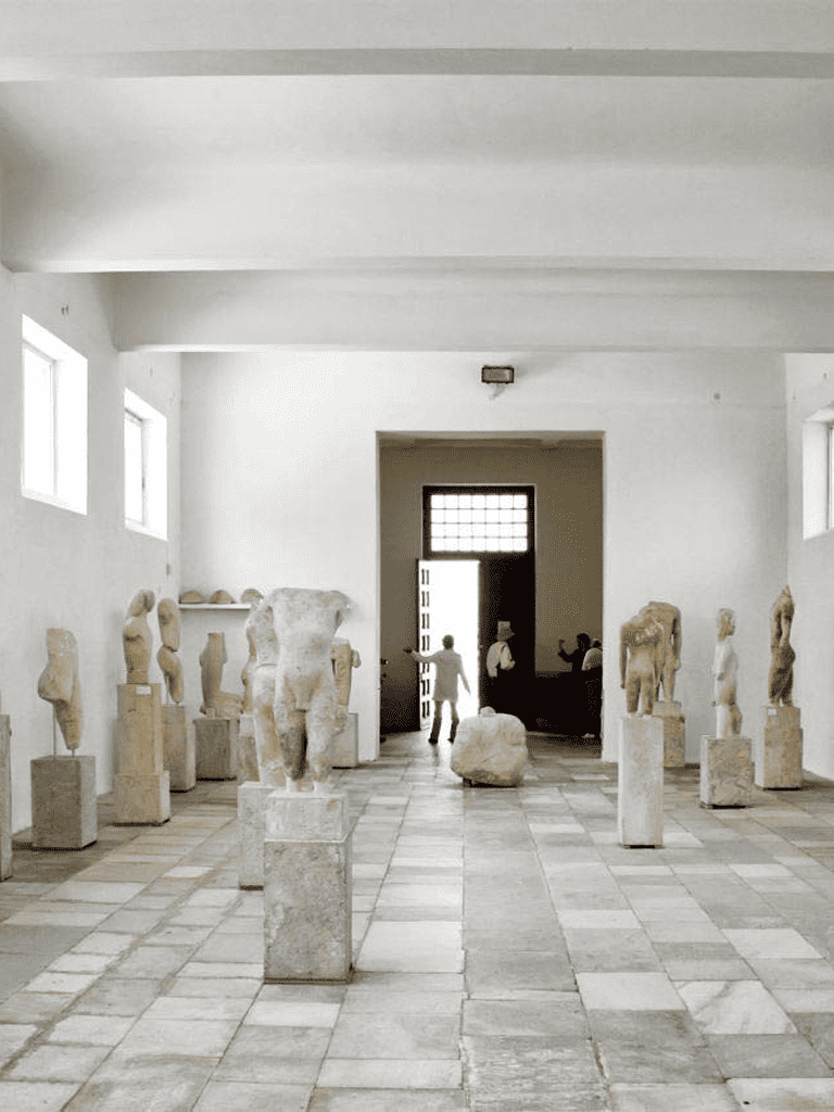 Ancient Greek sculptures in a museum showcasing classical art and history exhibits.