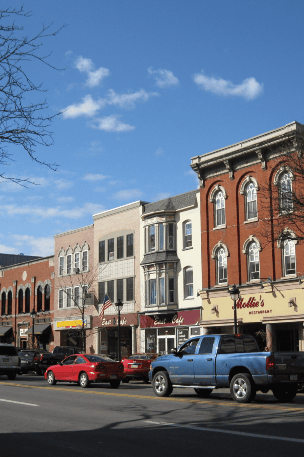 Charming downtown street with historic buildings and local restaurants.