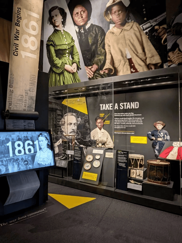 Civil War historical exhibit with diverse historic figures and artifacts, showcasing American history and African American experiences.