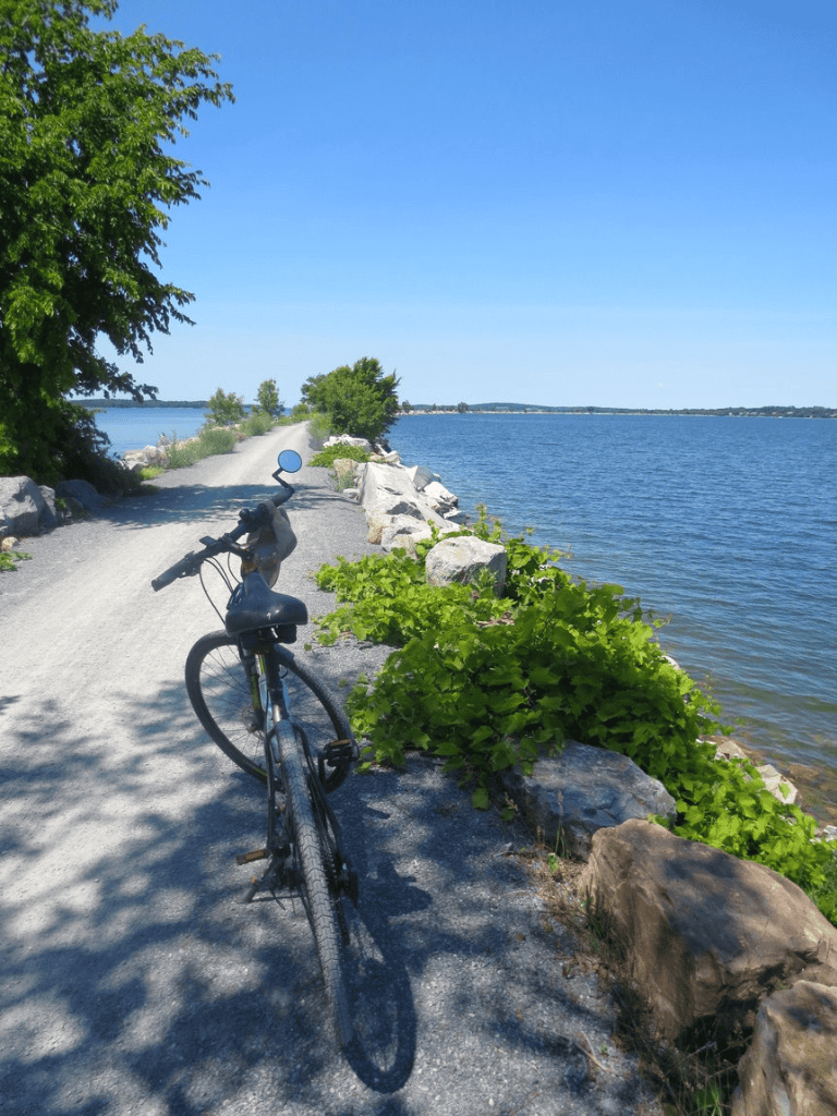 Bike by the lakeside on a scenic trail near QuestForDirections, perfect for outdoor navigation and exploring nature.