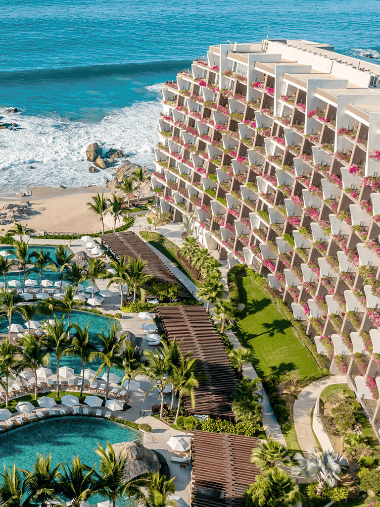 Luxurious beachfront hotel with ocean views, stunning pools, and tropical gardens. Perfect for a relaxing vacation.